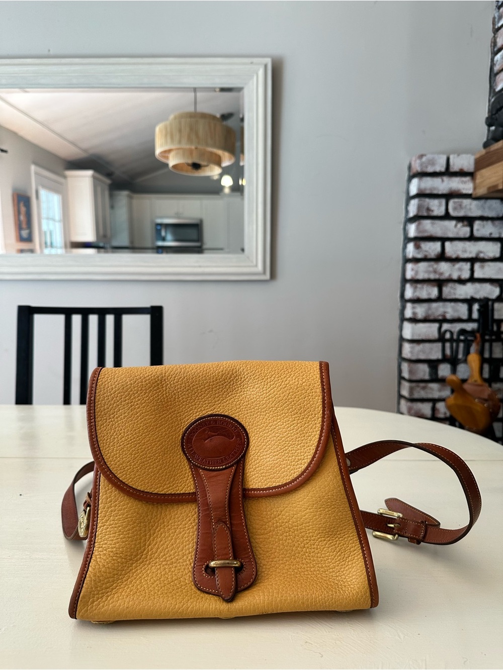 Dooney and Bourke yellow and Brown vintage leather Crossbody